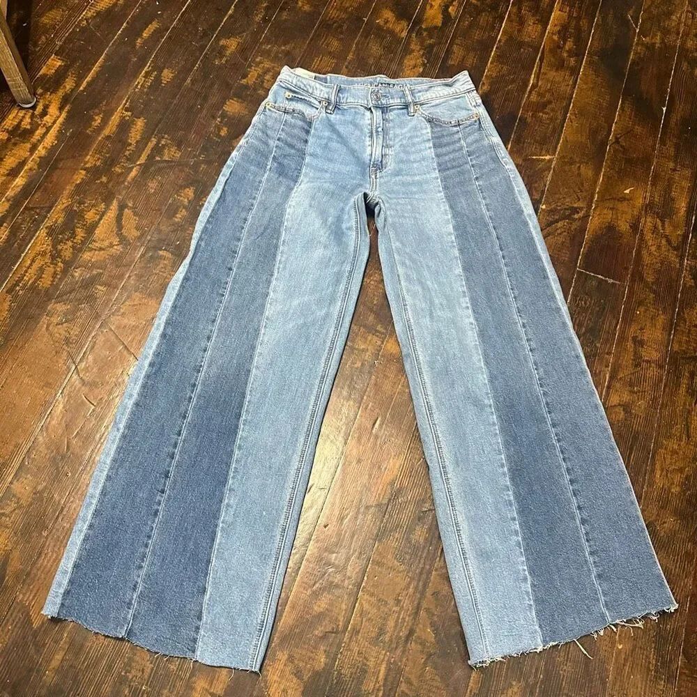 American Eagle distressed 0 low rise ultra flare raw hem jeans